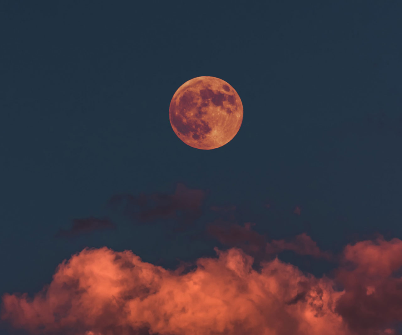 The moon over clouds.