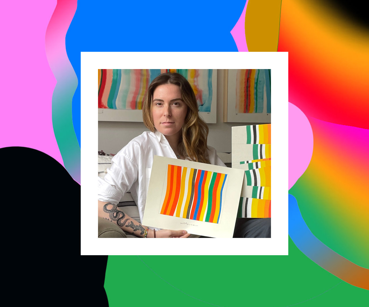 Amber Vittoria holding a piece of her artwork. A colorful background frames her image.