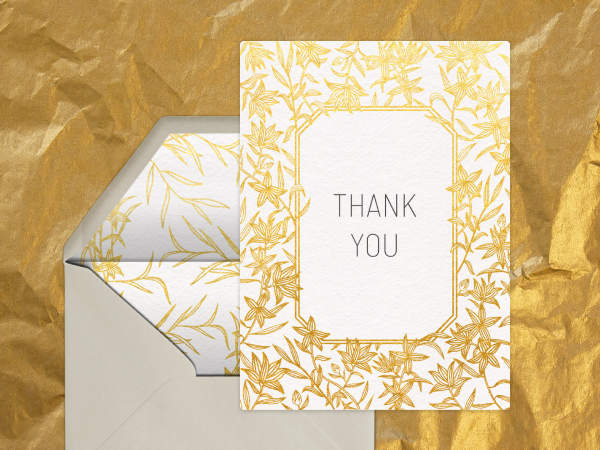 Thank you card with a gold foil floral border.