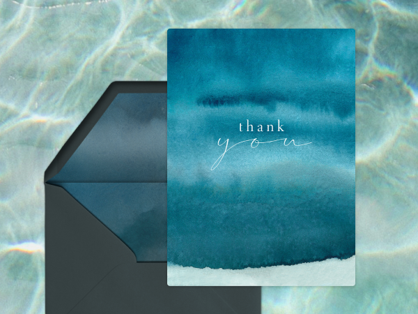 Teal watercolor blue thank you card against an ocean floor background.